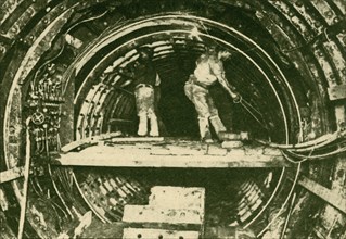 Enlarging Tunnels on the City and South London Railway, Shoowing New and Old Diameters', 1930.