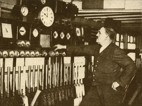 Recording Daily Time Signal at Liverpool Street Station, London and North Eastern Railway', 1930.