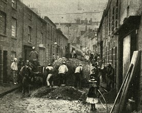 Removing Debris Brought Down By A Flood At St. Ives', 1901.