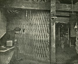 Rope Screen Used For Protection While Pressing Explosive Gun-Cotton', 1901.