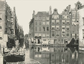 View of one of the main canals, Amsterdam, Netherlands, 1895.