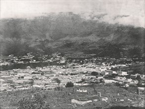 General view showing Table Mountain wreathed in vapour, Cape Town, South Africa, 1895.