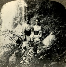 Maidens of the Land of the Rising Sun, beneath the Kogijoku waterfalls...', c1900.  .