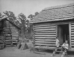 Negro Log Huts, Thomasville, Georgia', c1897.