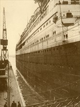 View of Starboard Side of the "Majestic" As She Entered the Floating Dry Dock', c1930.