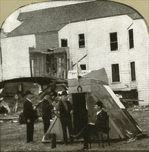 Refugees' camp, former dwelling in ruins in background. This is earthquake work', 1906.