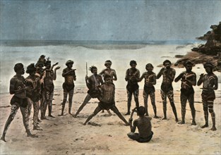 Nouvelle-Guinee. Danse Des Papous Barioles', (Papua New Guinea. Tribal Papuan Dance), 1900.