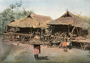 Nouvelle-Guinee. Karapuna. Village Indigene', (Papua New Guinea. Karapuna. Native Village), 1900.
