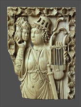Muse of the comedy with lyre, masks and sword, First quarter of 6th cen..