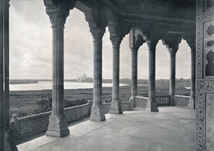 Agra. Balcony of the Jasmine Tower, showing the Taj', c1910.