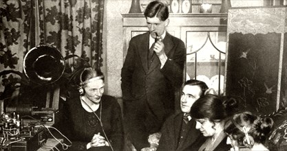 A family listening to the results of the general election of 1923,-1935