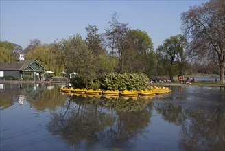 Regent's Park - Reflections of the gardens around the children's boating pond, London
