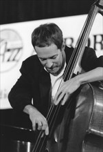 Phil Flanigan, playing double bass, c2002. Creator: Brian Foskett.