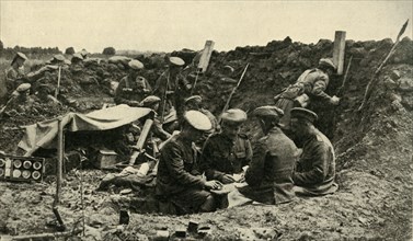 Soldiers playing cards in the trenches, First World War, c1916, (c1920).  Creator: Unknown.