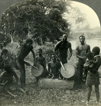 'The Drums of Africa - in the Village of Ikoko on Lake Ntomba in Belgian Congo', c1930s. Creator: Unknown.