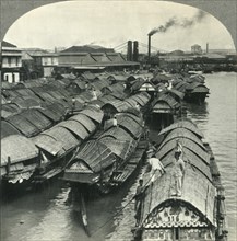 'A Busy Scene on the Pasig River, Manila, Island of Luzon, P.I. - Cascos, the Cargo Lighters and Coa Creator: Unknown.