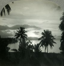 'Sunset behind Moorea, Seen from Papeete, Island of Tahiti', c1930s. Creator: Unknown.