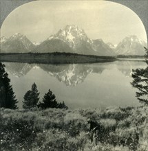 'The Teton Mountains across Jackson Lake, near Yellowstone Nat. Park, Wyo.', c1930s. Creator: Unknown.