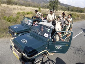Guides in truck, Jim Corbett Tiger Reserve, Uttarakhand. Creator: Unknown.