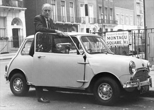 Lord Montagu with Mini in London, mid 1960's. Creator: Unknown.