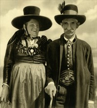 Couple in traditional dress, Sankt Lambrecht, Styria, Austria, c1935.  Creator: Unknown.