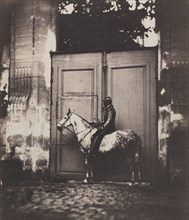 Black Horseman in Front of a Doorway, c. 1855. Creator: Unidentified Photographer.