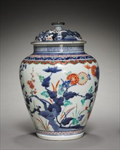 Covered Jar with Chrysanthemums, Peonies, and Prunus: In Kakiemon Style, late 17th century. Creator: Unknown.