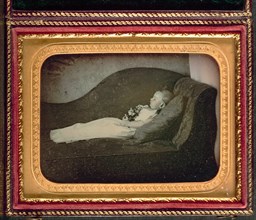 Dead Child On a Sofa, c. 1855. Creator: Unidentified Photographer.