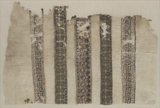 Fragment Composed of Parts of Three Tiraz-Style Textiles, 1094 - 1101. Creator: Unknown.