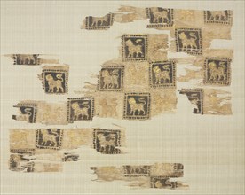 Fragment with gold leaf lions, 1000s - 1100s. Creator: Unknown.