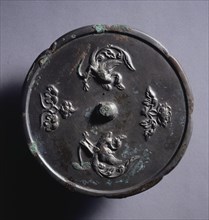 Lobed Mirror with Paired Phoenixes and Floral Displays, 8th century. Creator: Unknown.