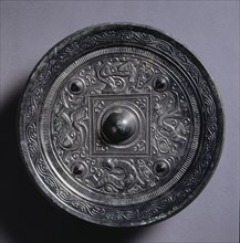 Mirror with a Central Square, an Immortal, and Auspicious Animals, 2nd century. Creator: Unknown.