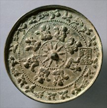 Mirror with Wheel Spokes and Riding Boys, c.1196-1234. Creator: Unknown.