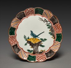 One of a Pair of Dishes with Singing Bird on a Rock: In Ko Kutani Style, 18th century. Creator: Unknown.