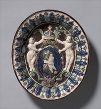 Oval Dish Commemorating the Ascent of the Young Louis XIII to the Throne of France, c. 1610-1615. Creator: Bernard Palissy (French, 1510-1589), school of.