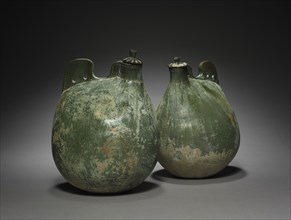Pair of Leather Bag-Shaped Flasks with Covers, 916-1125. Creator: Unknown.