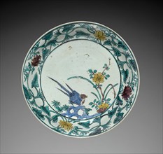 Plate with Bird and Flower: Kutani Ware, mid- to late 1600s. Creator: Unknown.