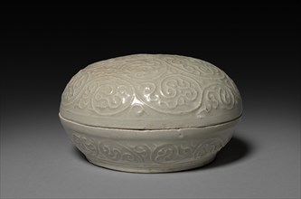 Round Covered Box with Floral Scrolls in Relief: Qingbai type Ware, 1300s. Creator: Unknown.