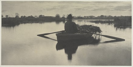 Rowing Home the Schoof-Stuff (from Life and Landscape on the Norfolk Broads, 1886, plate XXI), 1886. Creator: Peter Henry Emerson (British, 1856-1936); Sampson Low, Marston, Seale and Riverton (with T...