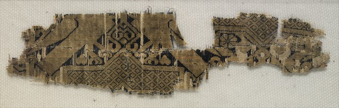 Textile Fragment with Portions of Eight-Pointed Star and Birds, 11th-12th century. Creator: Unknown.