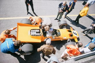 McLaren M74, Bruce McLaren 1969 British Grand Prix. Creator: Unknown.