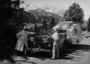 1937 Mercedes Benz 260D Cabriolet towing caravan. Creator: Unknown.