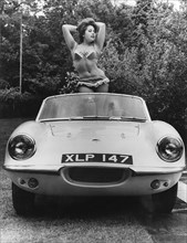 1959 Elva with posing female model. Creator: Unknown.