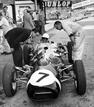 1961 Ferguson P99, Stirling Moss in pits with APR Rolt and Alf Francis . Creator: Unknown.