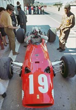 Ferrari in pits during 1968 Spanish Grand Prix, Chris Amon. Creator: Unknown.