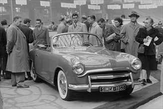 1953 Simca 8 Sport at motor show. Creator: Unknown.