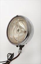 Lucas bi-flex long range electric headlamp circa 1928. Creator: Unknown.