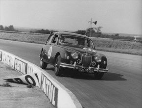 Jaguar 3.4 Mark1 J.W. Dean at Silverstone 1961. Creator: Unknown.