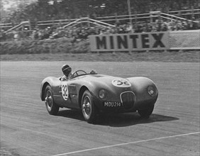 Jaguar C type , Duncan Hamilton 1951. Creator: Unknown.
