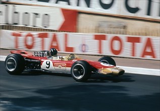 Lotus 49, Gold Leaf, driven by Graham Hill at the 1968 Monaco Grand Prix. Creator: Unknown.